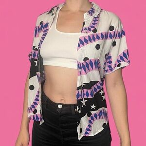 White and pink short sleeve button down shirt with fun pattern !!